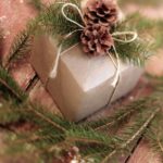 Brown paper, string and pinecone as decoration